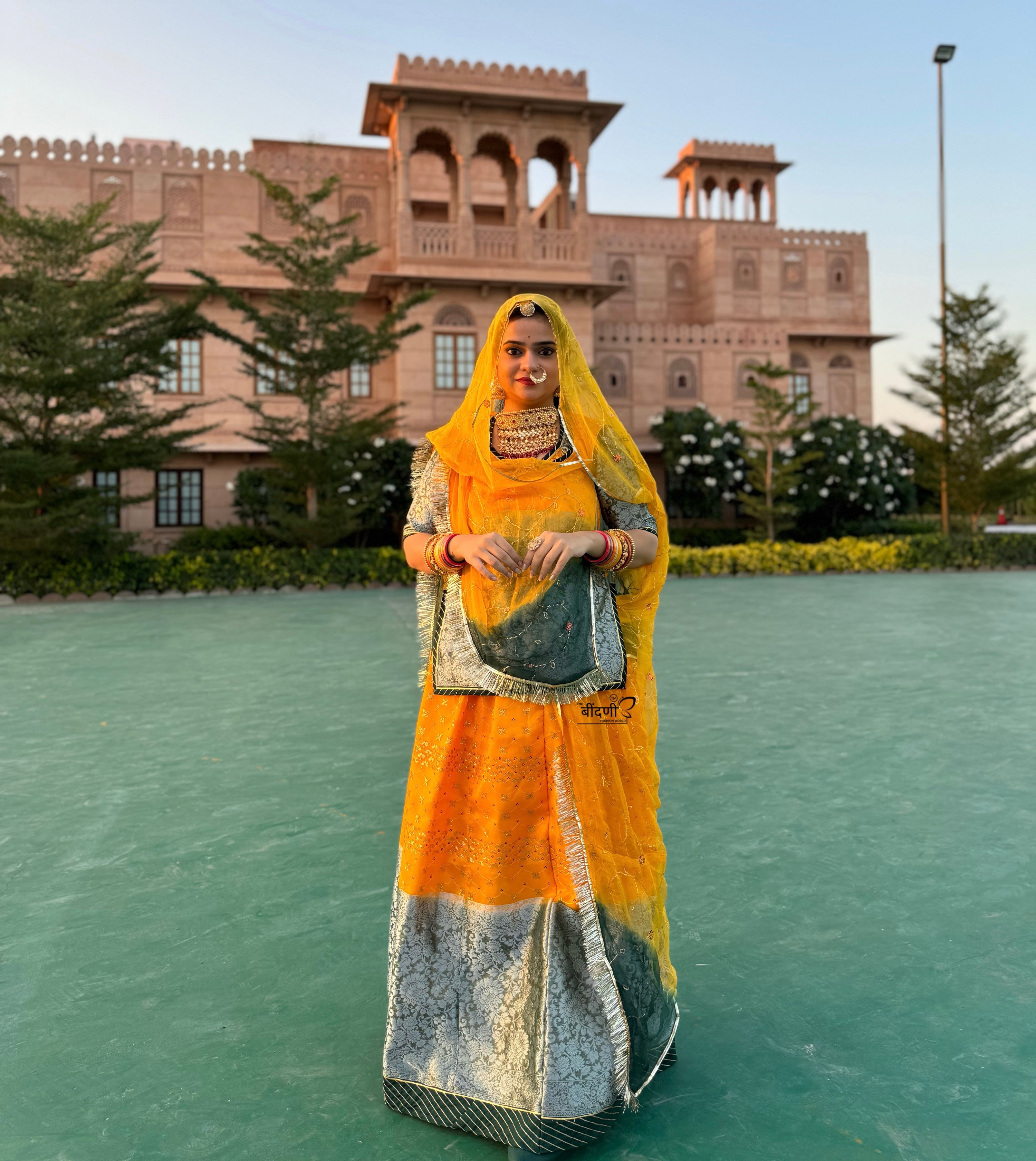 Bindani Sunlight Elegance: Yellow Organza Poshak with Banarasi Border(Semi stich)