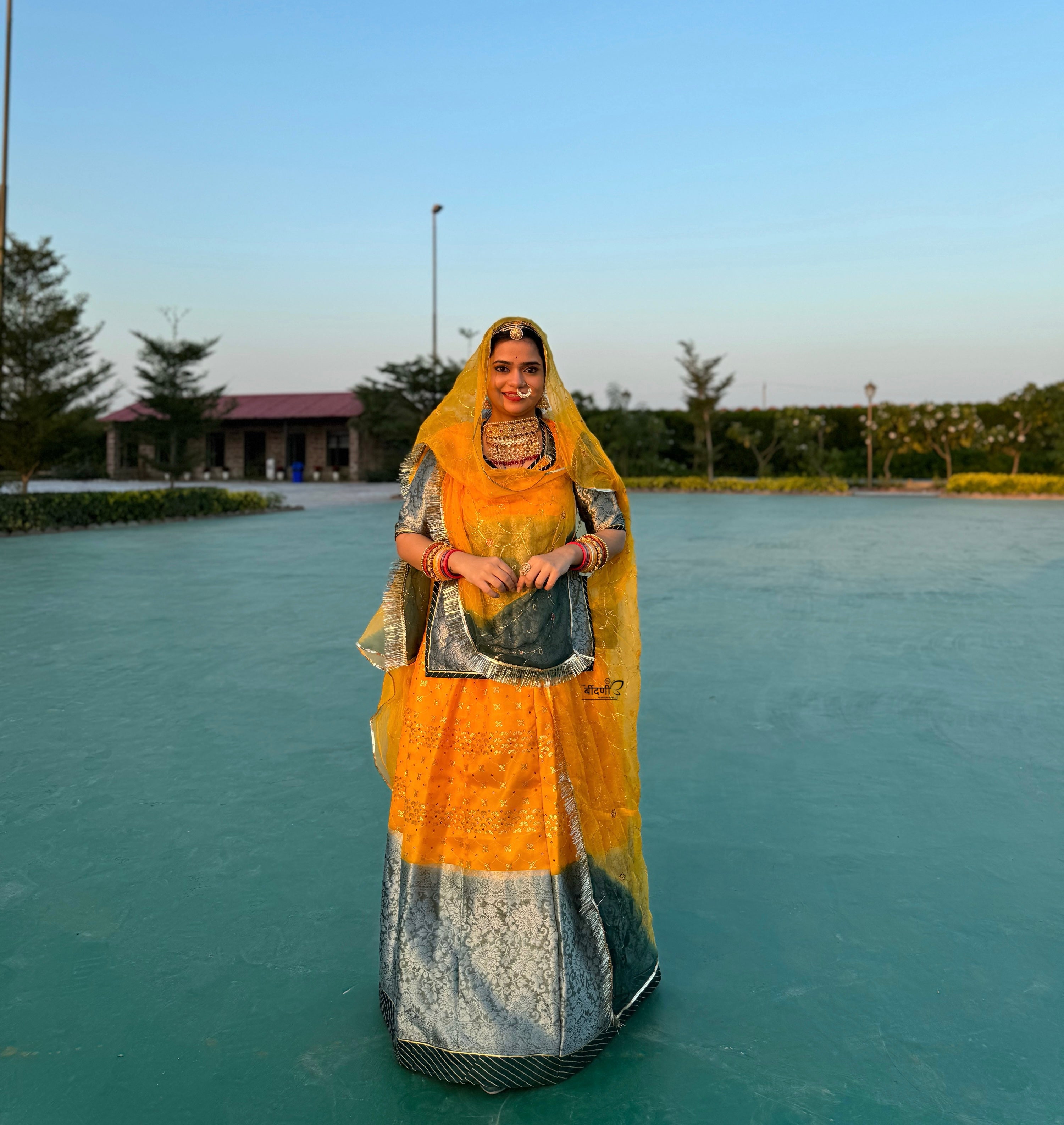 Bindani Sunlight Elegance: Yellow Organza Poshak with Banarasi Border(Semi stich)