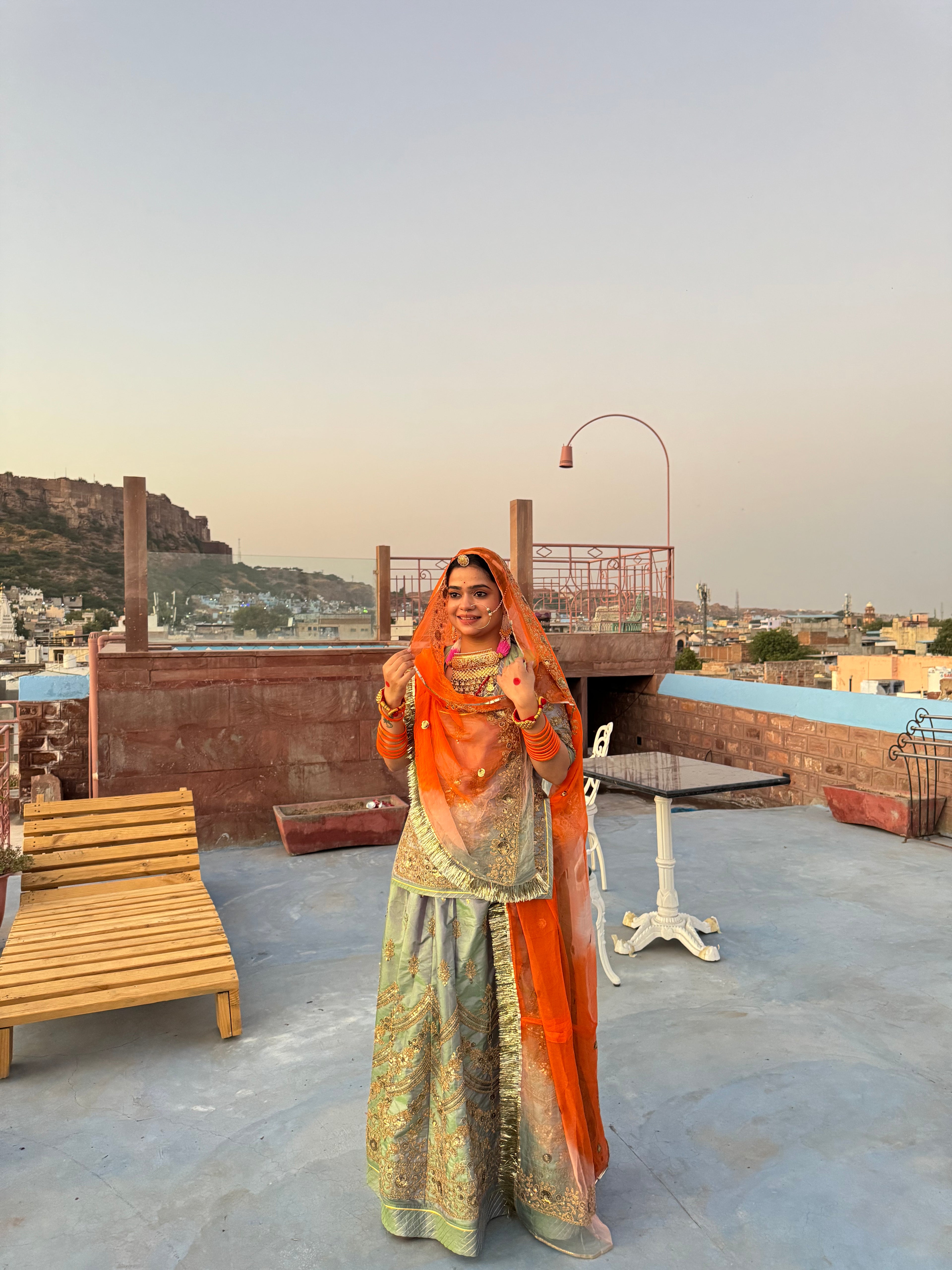 Bindani Graceful Harmony: Mehendi Green Poshak with Contrasting Odhna