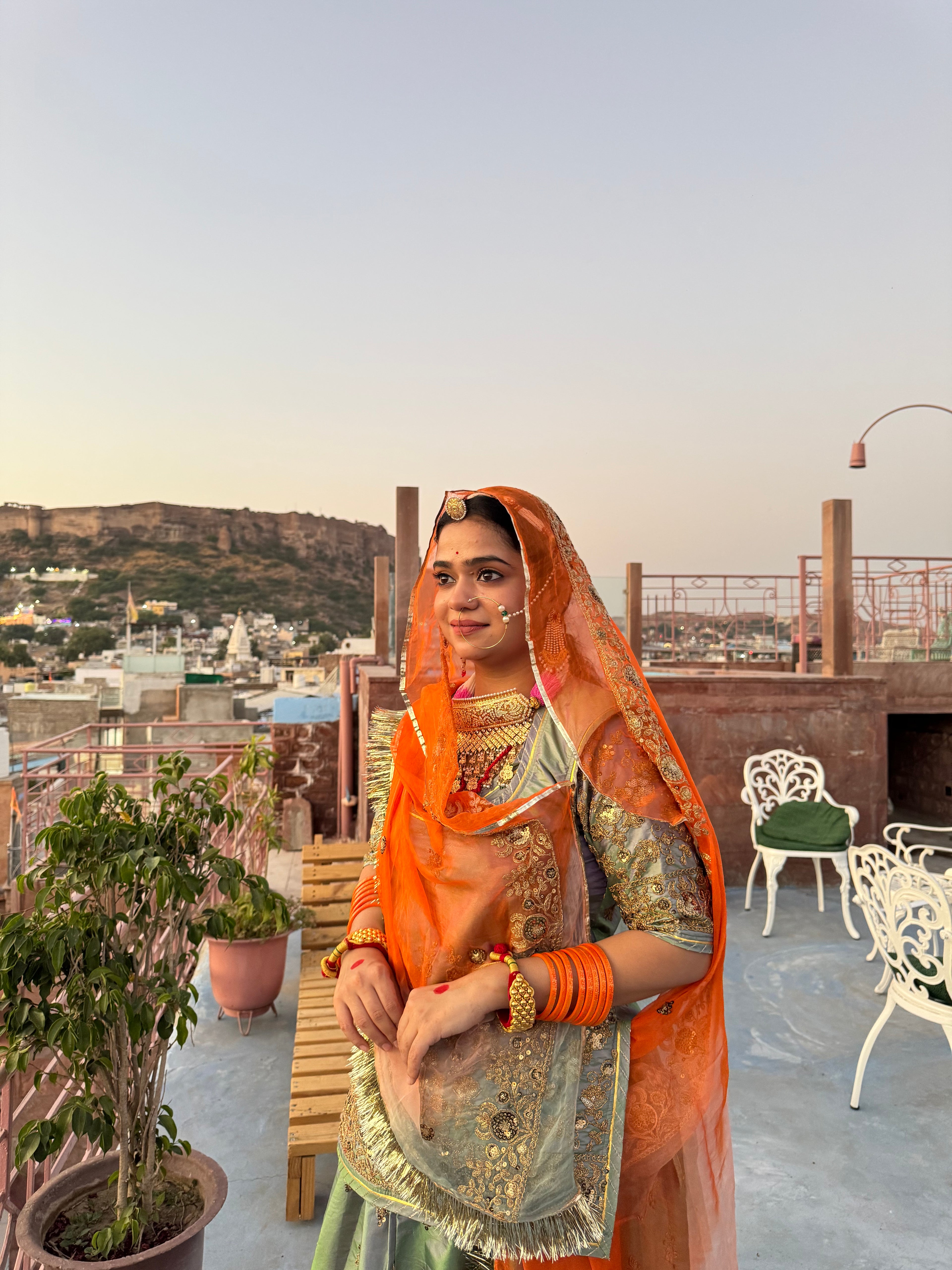 Bindani Graceful Harmony: Mehendi Green Poshak with Contrasting Odhna