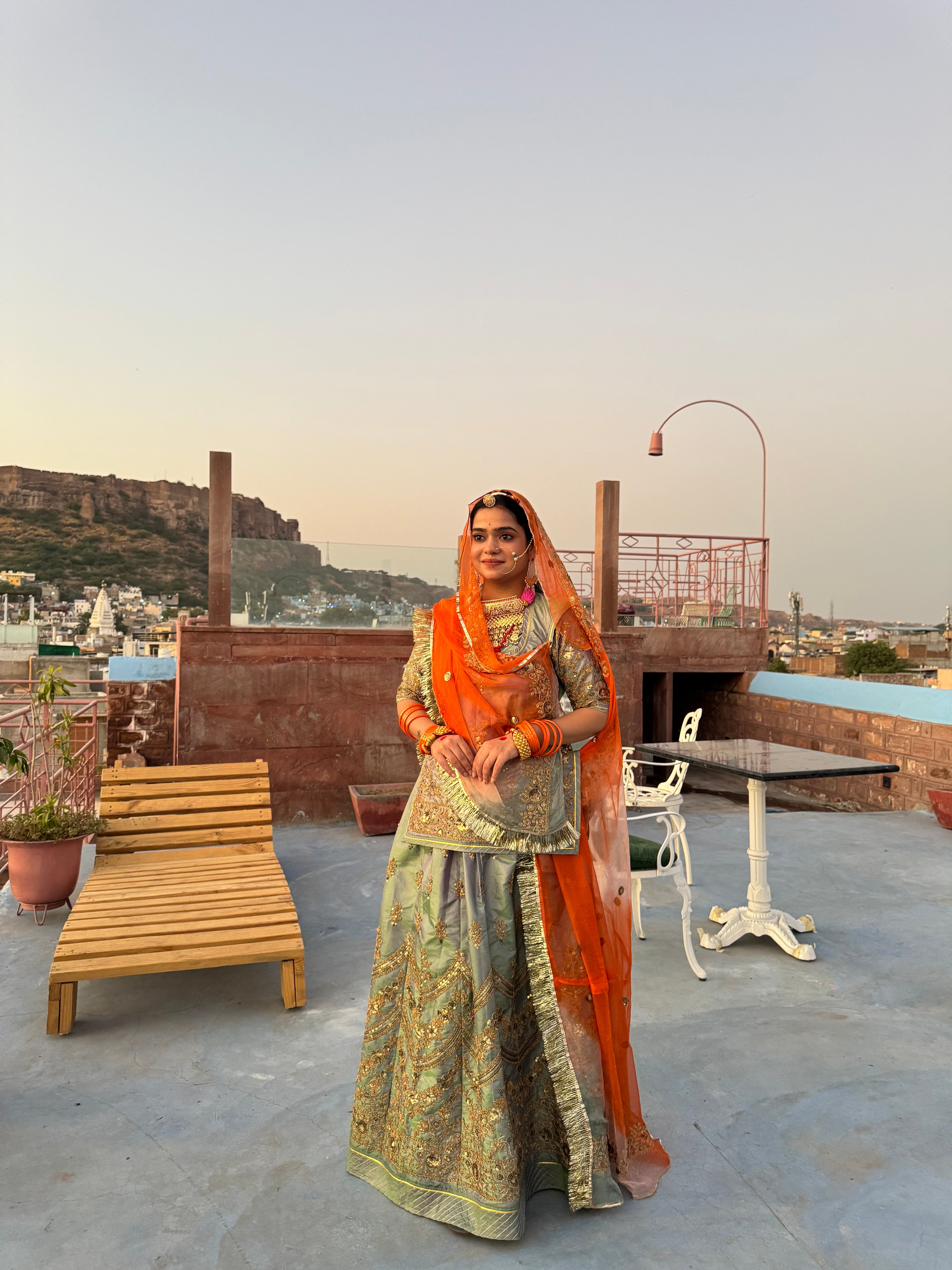 Bindani Graceful Harmony: Mehendi Green Poshak with Contrasting Odhna
