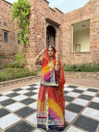 Bindani Chic and Colorful: Stunning Organza Poshak with Intricate Gota Accents(Semi stich)