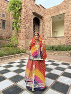 Bindani Chic and Colorful: Stunning Organza Poshak with Intricate Gota Accents(Semi stich)