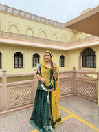 Bindani Green Glamour: Classic Poshak with contrast Odhna