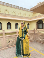 Bindani Green Glamour: Classic Poshak with contrast Odhna
