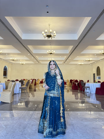 Serenade in Teal: Satin Poshak adorned with Silver Elegance(Semi stich)