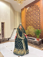 Emerald Elegance: The Green Tissu Poshak Collection(semi stich)