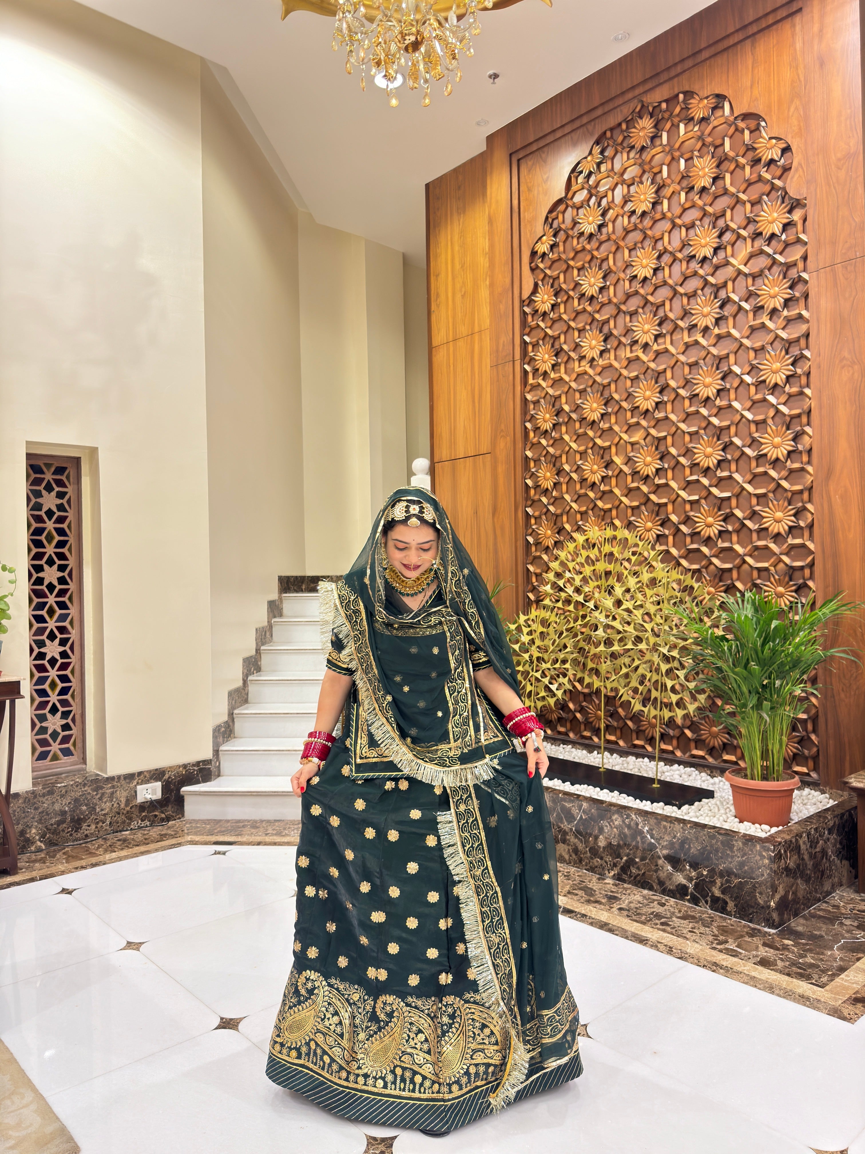 Emerald Elegance: The Green Tissu Poshak Collection(semi stich)