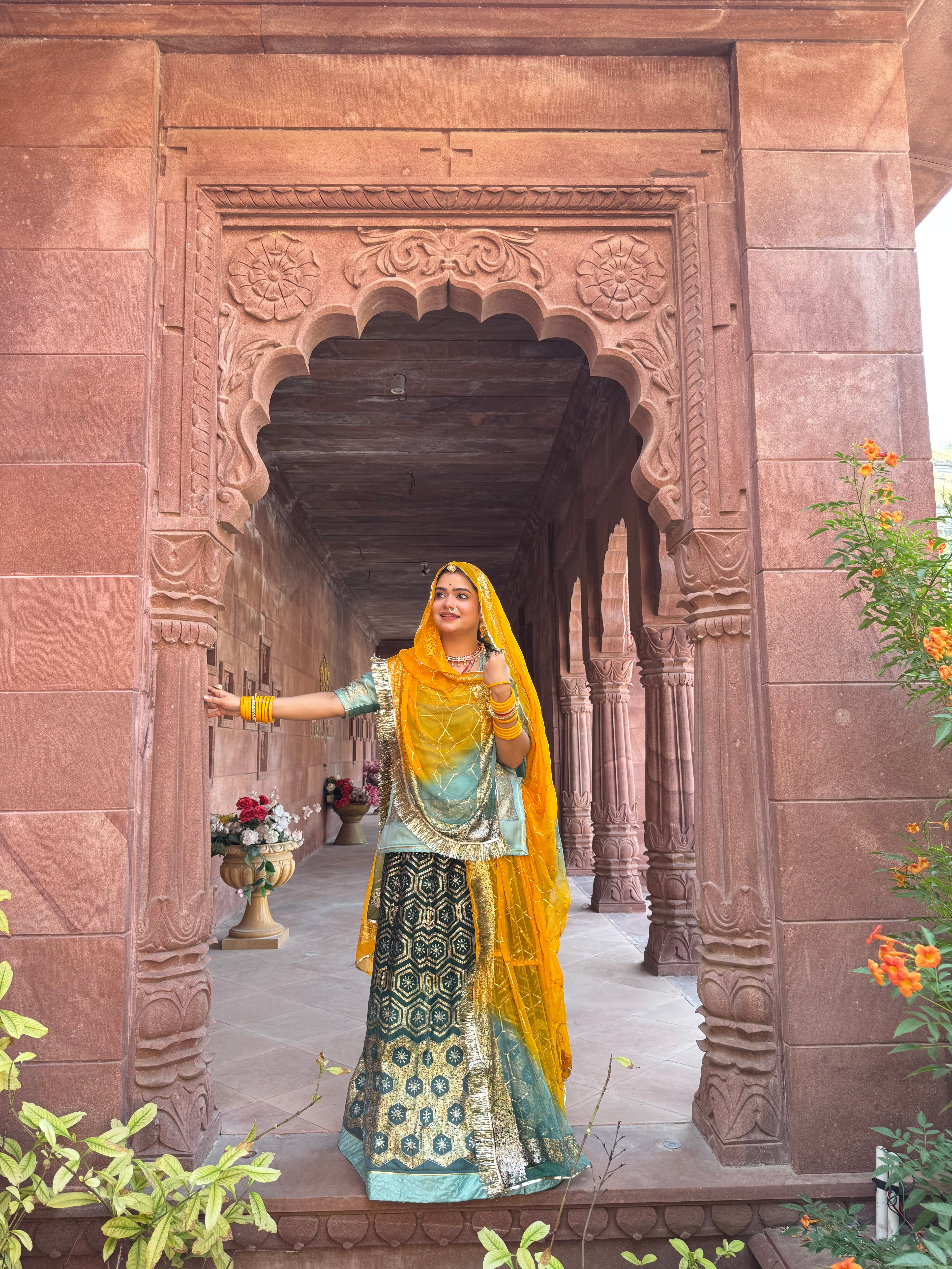 Bindani Emerald Grace: The Green Organza Poshak with Contrast Odhna