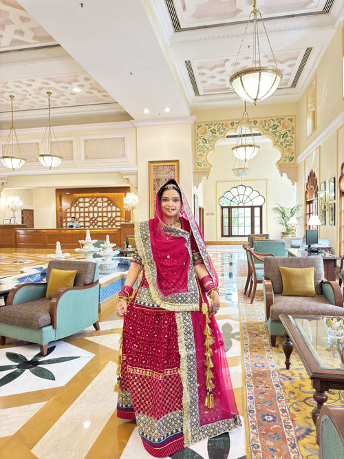 Royal Crimson: Velvet Poshak Adorned with Lace Border