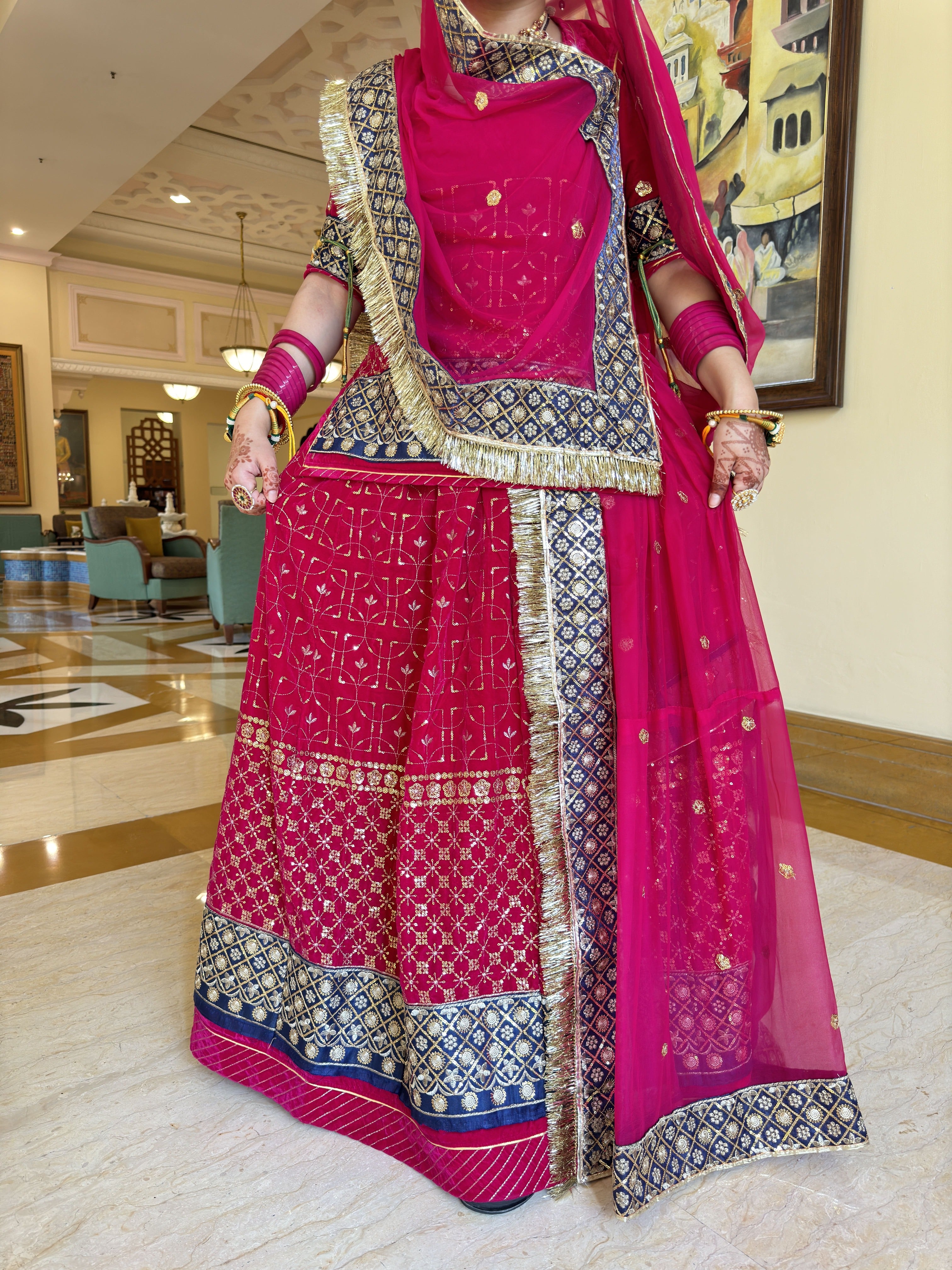 Royal Crimson: Velvet Poshak Adorned with Lace Border