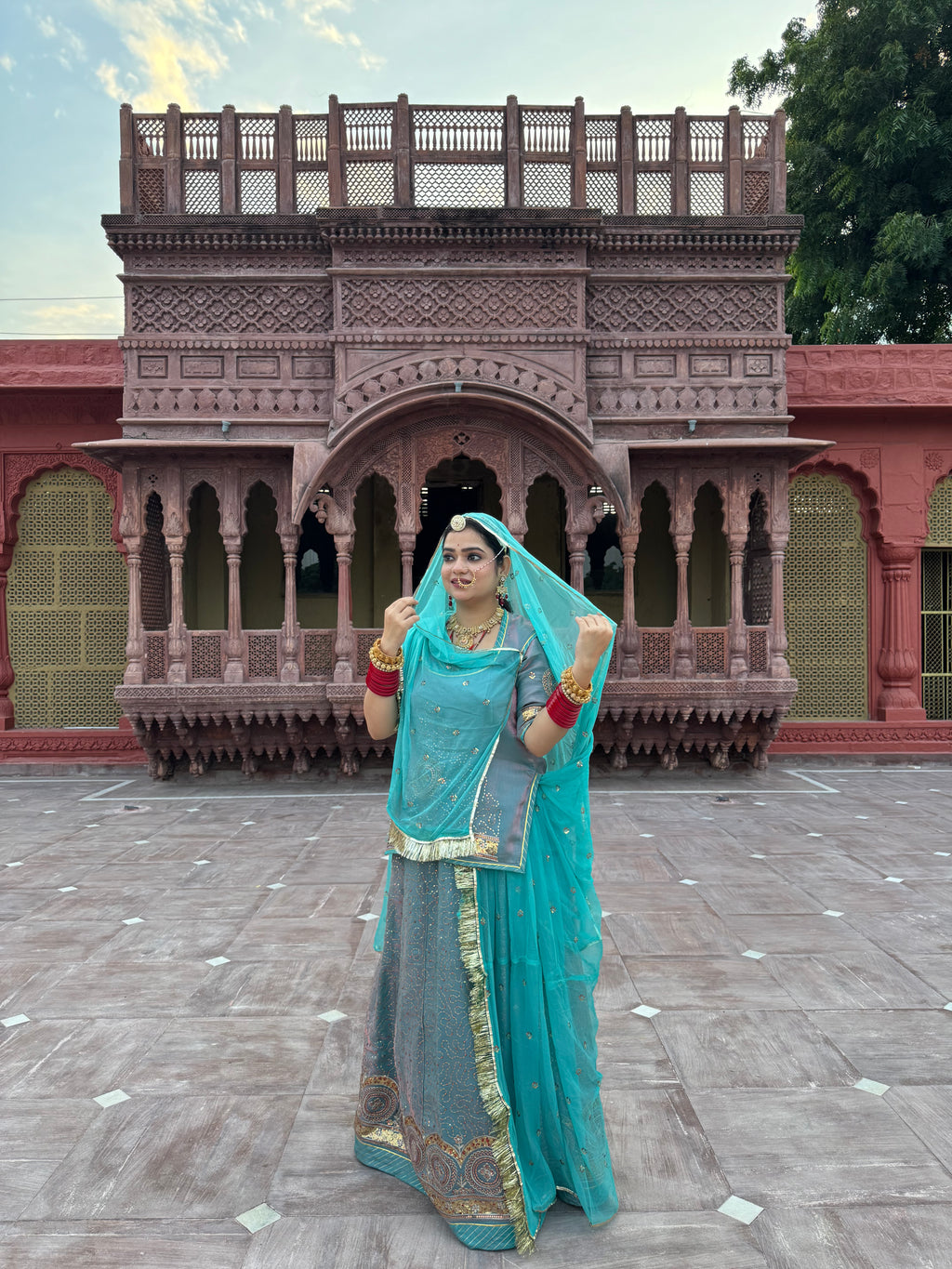 Bindani Graceful Elegance: Sky Blue Tissue Suit