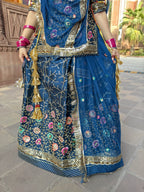 Bindani Floral Fantasy: Blue Tissu Poshak with Delicate Flower Embroidery(Semi stich)