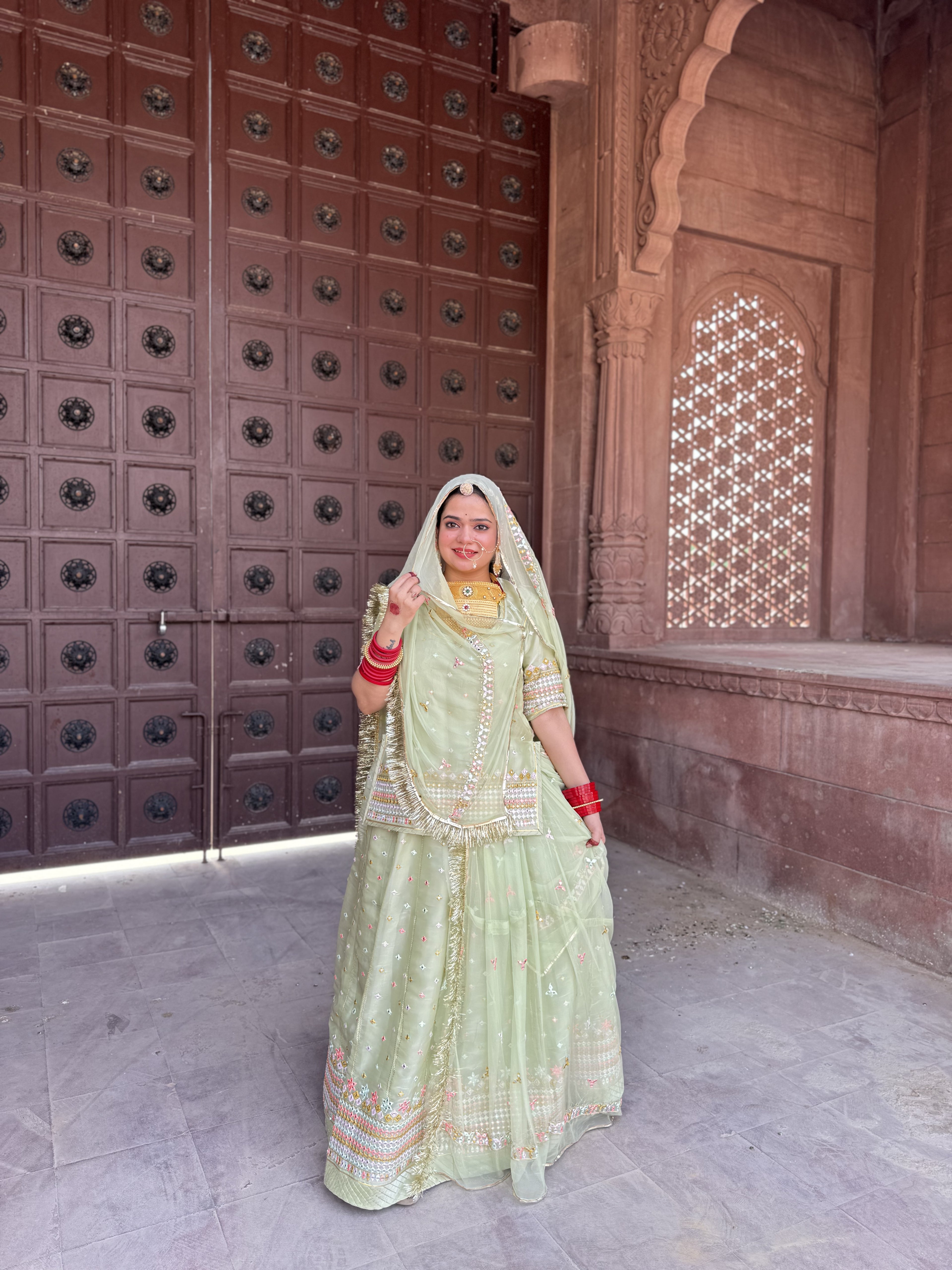 Exquisite Tissu Poshak with Vibrant Multicolor Thread Work(semi stich)