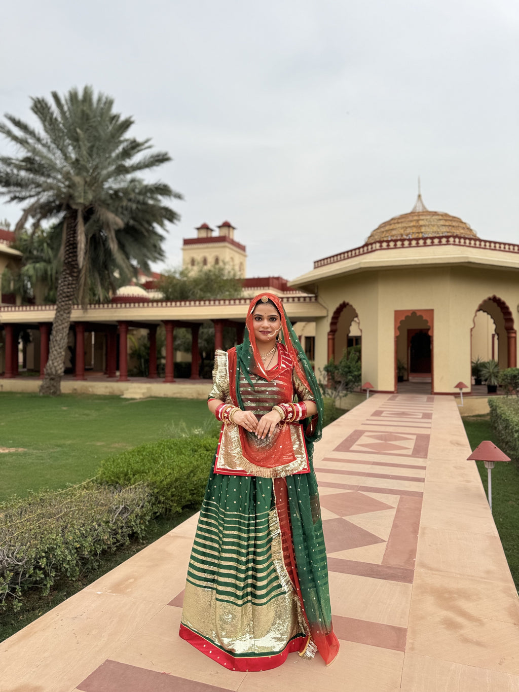 Bindani Emerald Elegance: Satin Green Poshak with Sequence Work