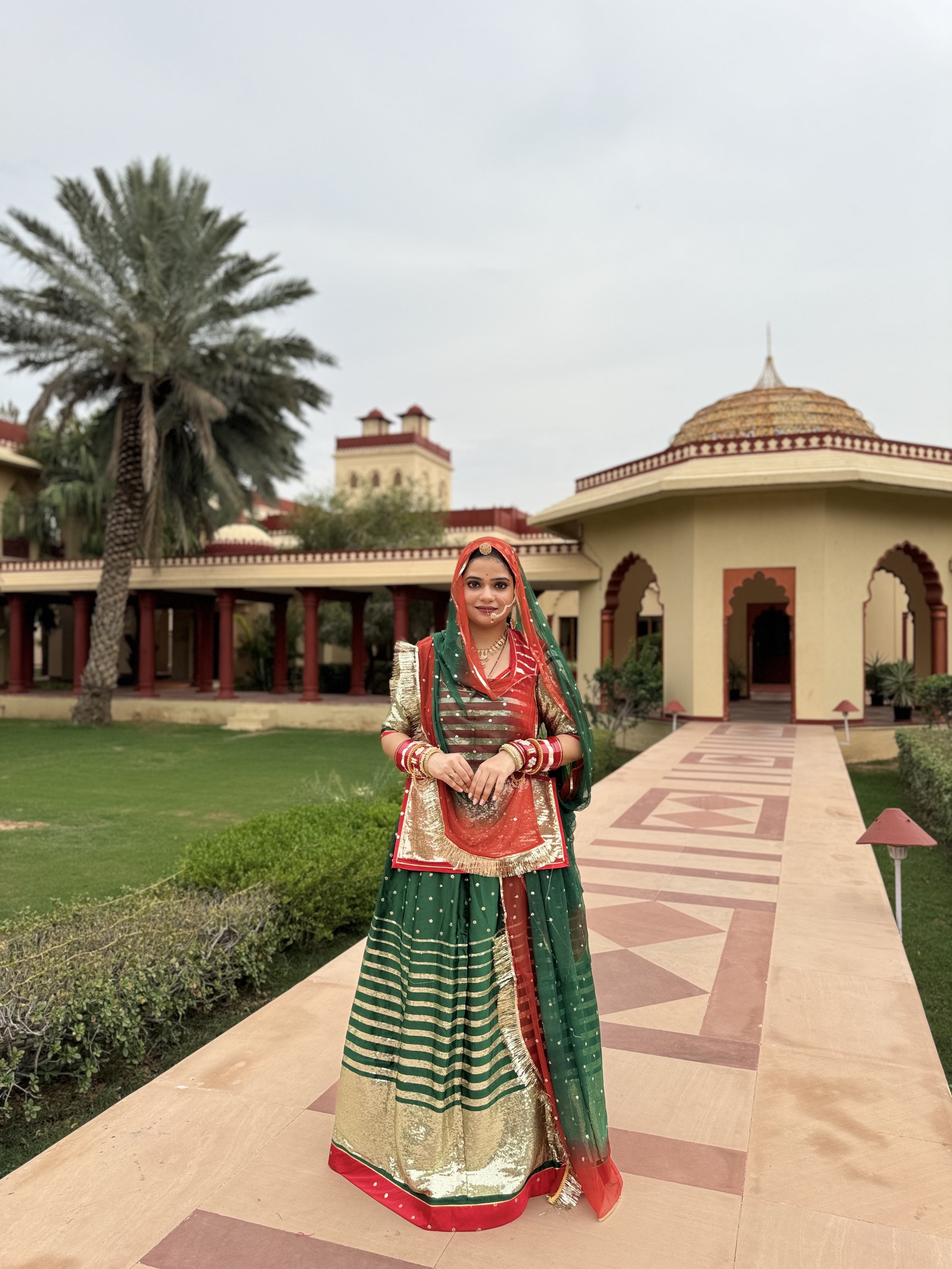 Bindani Emerald Elegance: Satin Green Poshak with Sequence Work