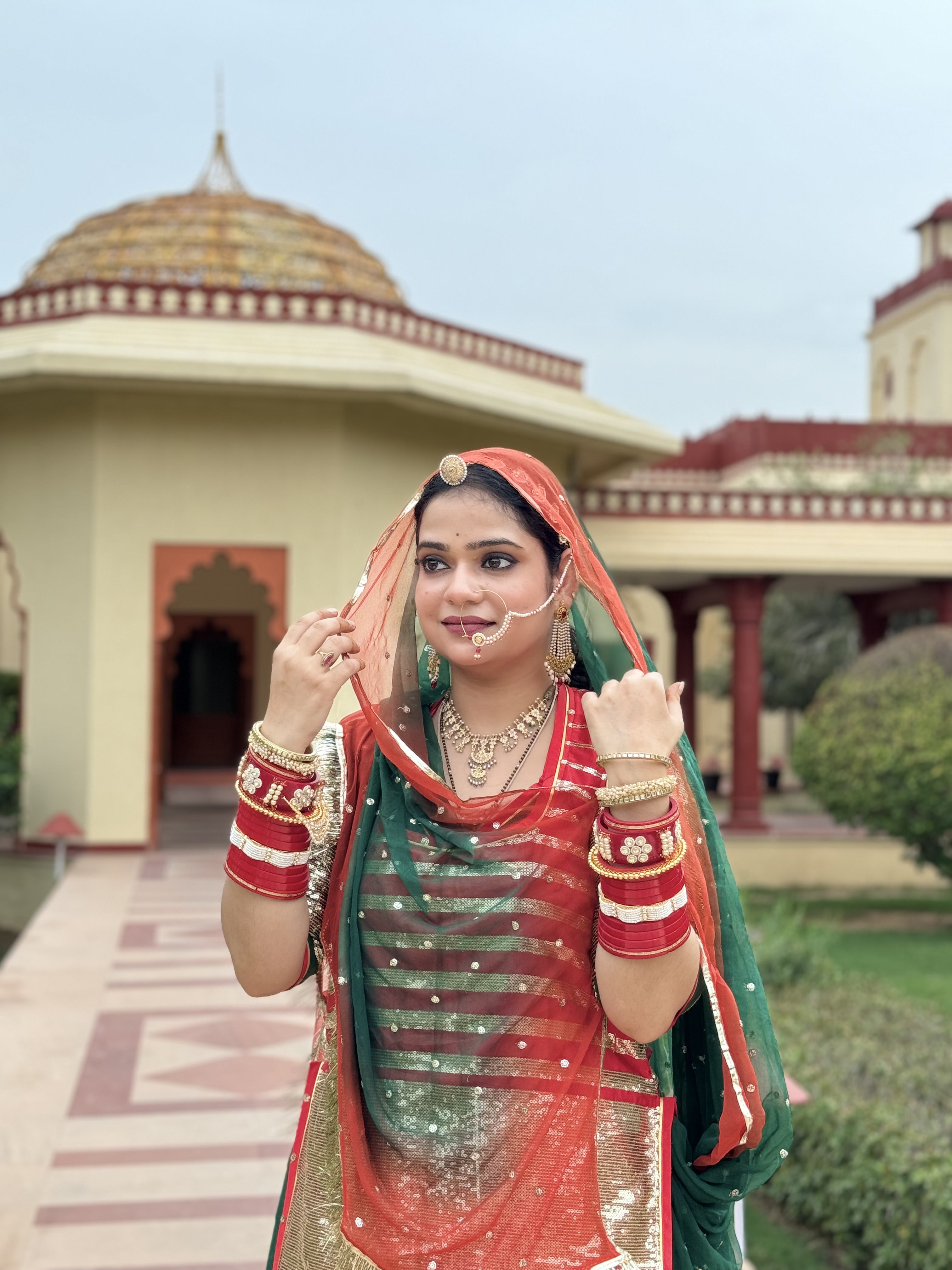 Bindani Emerald Elegance: Satin Green Poshak with Sequence Work