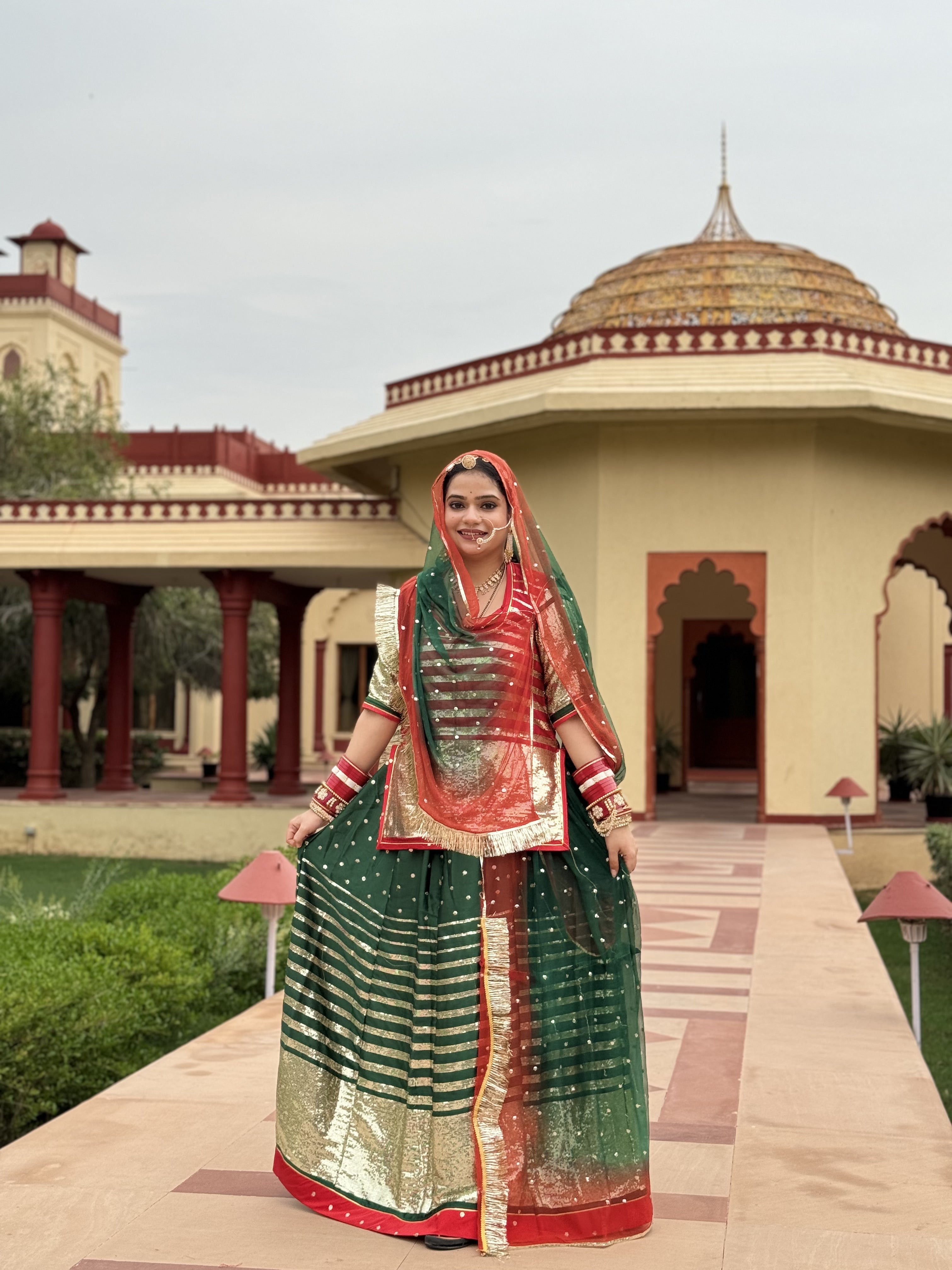 Bindani Emerald Elegance: Satin Green Poshak with Sequence Work