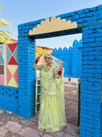 Bindani Graceful Elegance: Pista Green Net Poshak