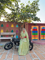 Bindani Graceful Elegance: Pista Green Net Poshak