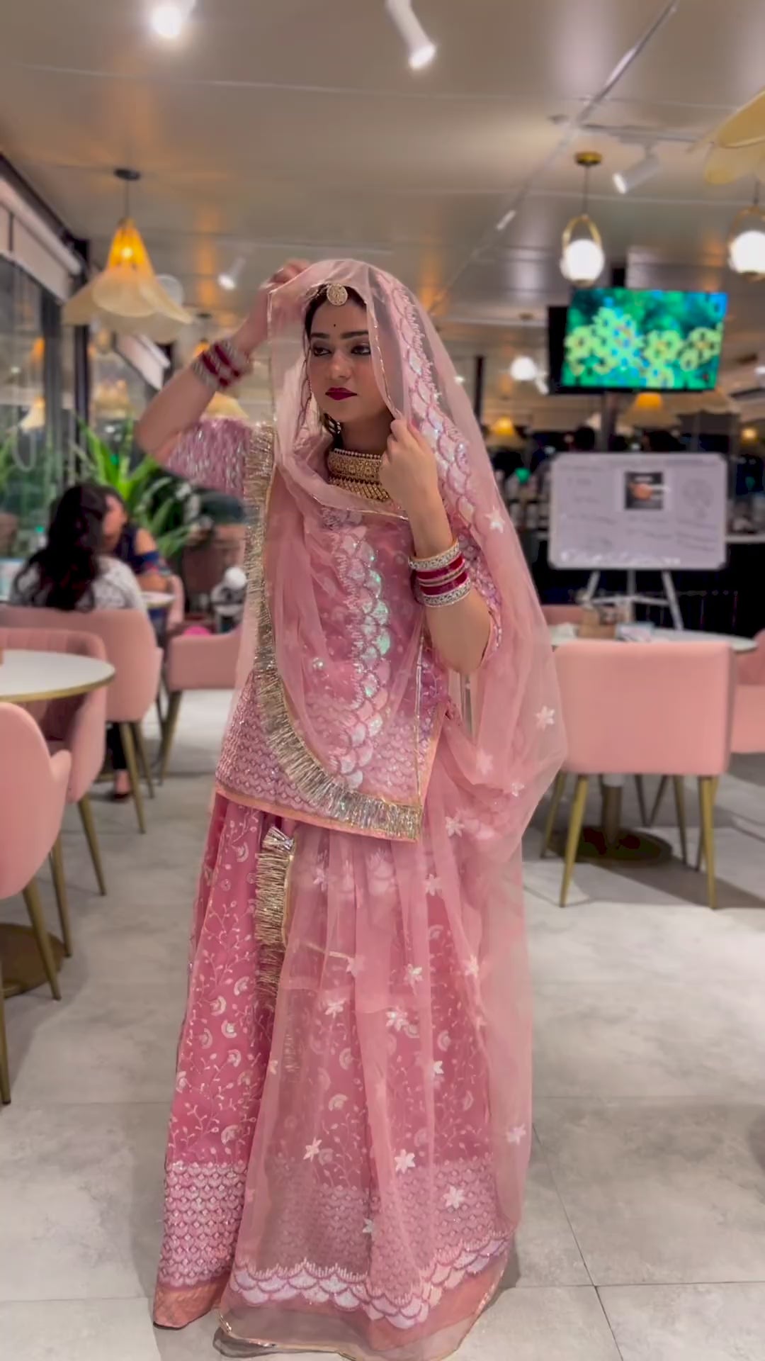 Blushing Elegance: Pink Net Poshak with Sheer Net Odhna(Semi stich)