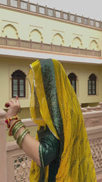 Bindani Green Glamour: Classic Poshak with contrast Odhna