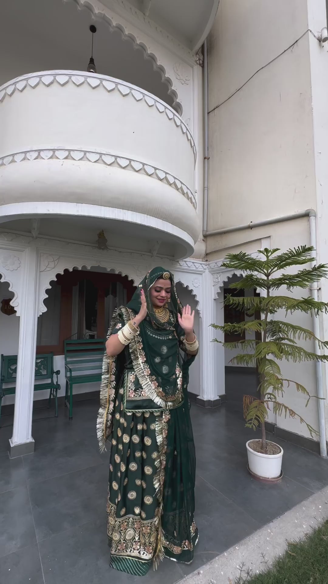 Emerald Elegance: A Green Satin Poshak Adorned with Zari Brilliance