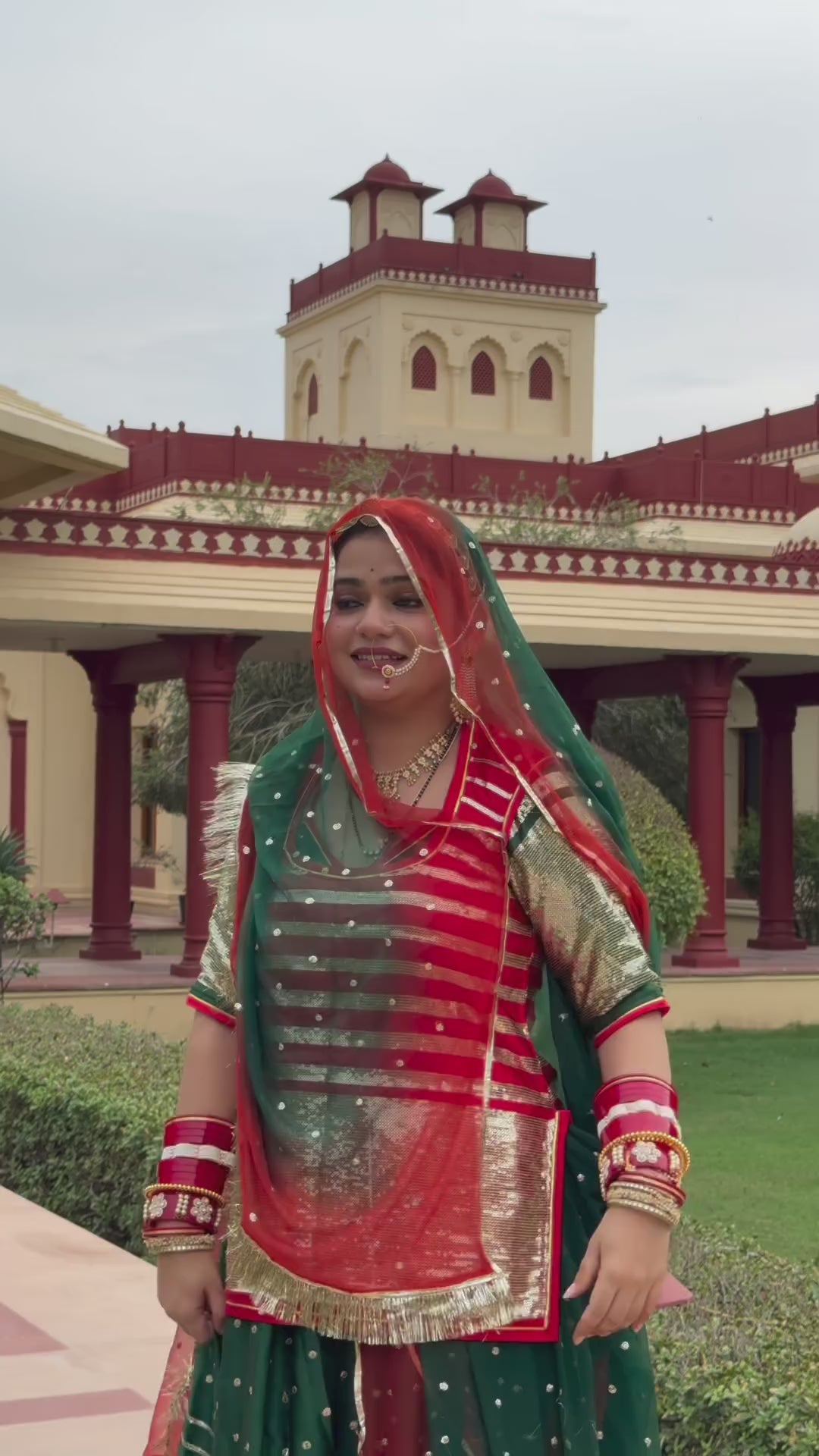 Bindani Emerald Elegance: Satin Green Poshak with Sequence Work